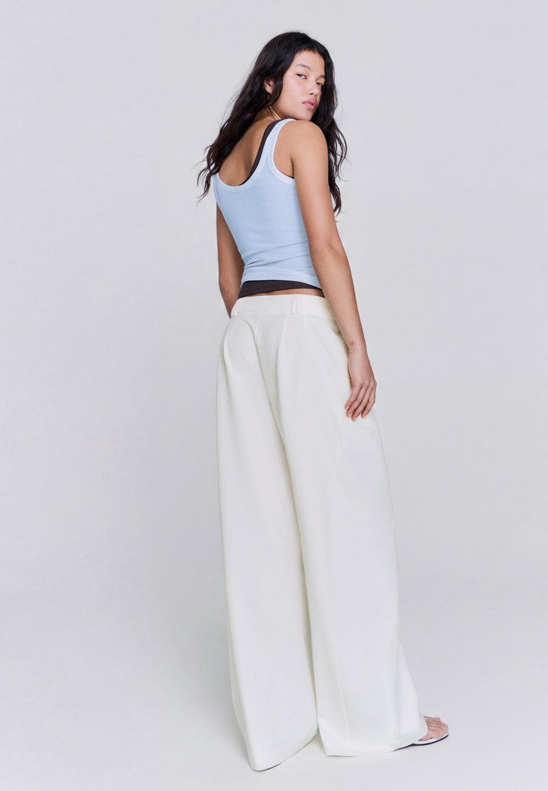 Trousers - beige