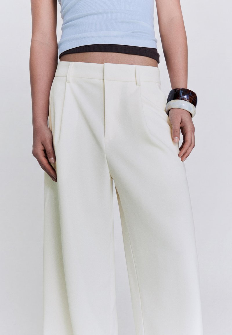 Trousers - beige